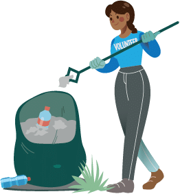 A woman putting trash into a bag using a grabber